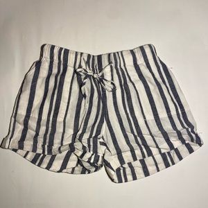 Blue and white striped shorts with tie and pockets